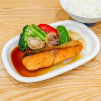 Salmon Teriyaki · Seared filet simmered in our reduced teriyaki sauce with side of rice & mixed vegetables