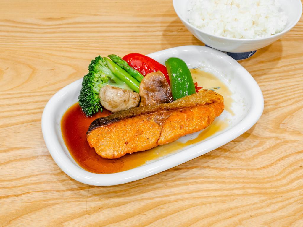 Salmon Teriyaki · Seared filet simmered in our reduced teriyaki sauce with side of rice & mixed vegetables