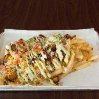 Firecracker Pork Belly Loaded Fries · Brined and slow roasted pork belly, cubed and sauteed with caramelized onions in a sweet and...