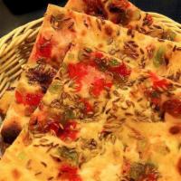 Kashmiri Naan · Naan stuffed with nuts and dry fruits.