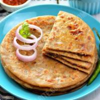 Paratha · Whole wheat bread layered with butter and baked in a tandoor oven.