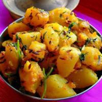 Aloo Jeera · Peeled potatoes seasoned with cumin seed, Indian herbs and spices.