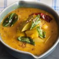Mango Sabzi · Mixed vegetables and mango cooked with onions, tomatoes, ginger, garlic and Indian spices.
