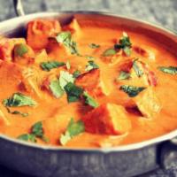 Paneer Tikka Masala · Traditionally homemade cheese cooked in creamy onion and tomato sauce.