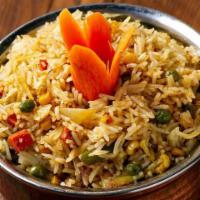 Vegetable Biryani · Long grain aromatic basmati rice cooked with mixed vegetables. Flavored with Indian herbs an...
