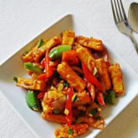 Paneer Chili · Traditional homemade cheese with green peppers and onions in chili sauce.