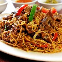 Chicken Noodle · Hakka noodle sauteed with chicken, vegetable, ketchup, soy sauce and garlic chili paste.