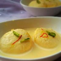 Rasmalai · Homemade cream cheese patties served in a sweet cream sauce flavored with cardamom and garni...