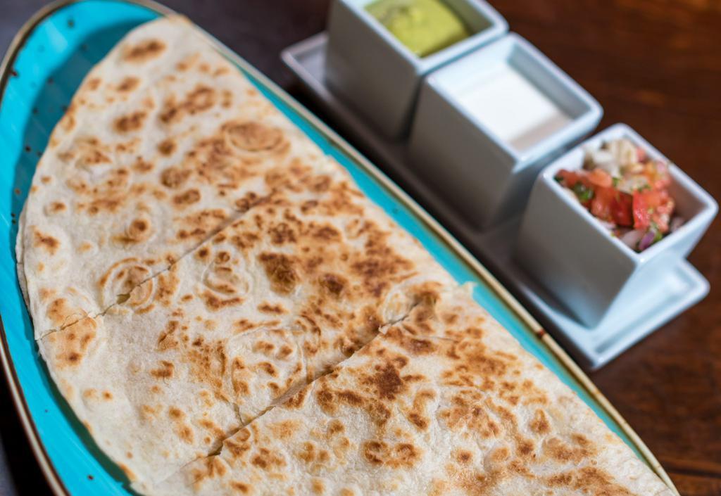 Quesadillas · Grilled flour tortilla and cheese. Served with pico de gallo, sour cream and green sauce.