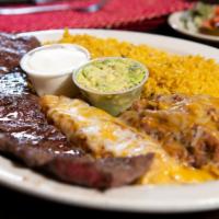 Tampiquena de Churrasco · Grilled skirt steak served with cheese enchilada, yellow rice, refried beans and topped with...