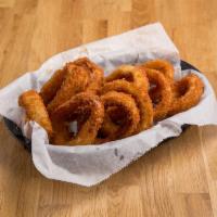 BASKET OF RINGS · Golden, crispy fried onion rings served with ranch