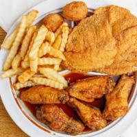 2 Piece Tilapia Fish and 5 Piece Wings Combo · Served with fries, hush-puppies, drink and tartar sauce.