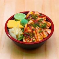 Spicy Seared Salmon Bowl · The Spicy Seared Salmon Bowl contains rice and mixed greens. It contains 1 scoop of raw salm...