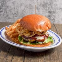 The Smokehouse Burger · 1/2 pound burger, sweet and smoky BBQ sauce, pepper jack cheese, lettuce, tomato and crispy ...