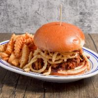 BBQ Pulled Pork · House smoked pulled pork, sweet and smoky BBQ sauce and crispy onion straws.