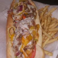 4. That Philly Tho! Brisket  · Sauteed onions and garlic, banana peppers, baby bell peppers (none of those green), Boss sau...