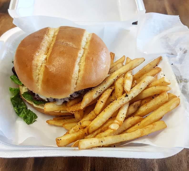 King Classic · Single burger with sautéed onions and garlic, lettuce, tomato, Provolone cheese and a small fry!