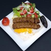 Ground Beef kabab · Seasoned and grilled ground-beef skewers (2). Served with white basmati rice,salad,grilled t...