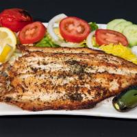 Boneless Rainbow Trout Plate · Whole trout marinated with lemon and oregano. Served with rice and salad.  