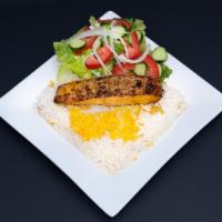Salmon Platter · A fillet of marinated salmon served with white rice a side of taboulleh salad or hummus.