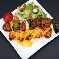 Chicken and filet combo · 1 skewer Boneless chicken and 1 skewer of shish(filet) served with basmati rice, salad,grill...