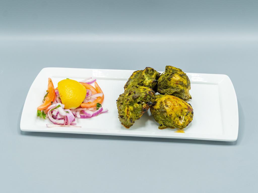 Hariyali Tikka · Chicken breast in cilantro chutney and grilled.