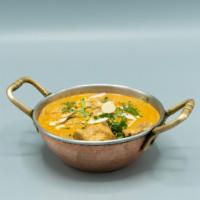 Lamb Avadh Korma Specialty · Lamb cooked in rich, creamy almond gravy.