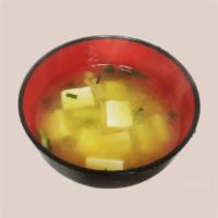 A3. Miso Soup · Miso soup with tofu and scallion.