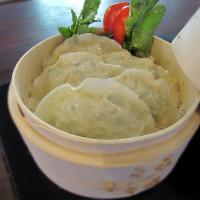 A18. Steamed Dumpling (5pcs) · 5 pieces of steamed vegetable home made dumpling.