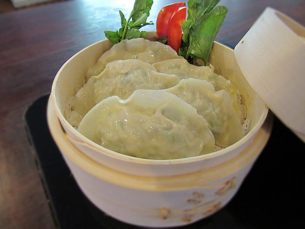A18. Steamed Dumpling (5pcs) · 5 pieces of steamed vegetable home made dumpling.