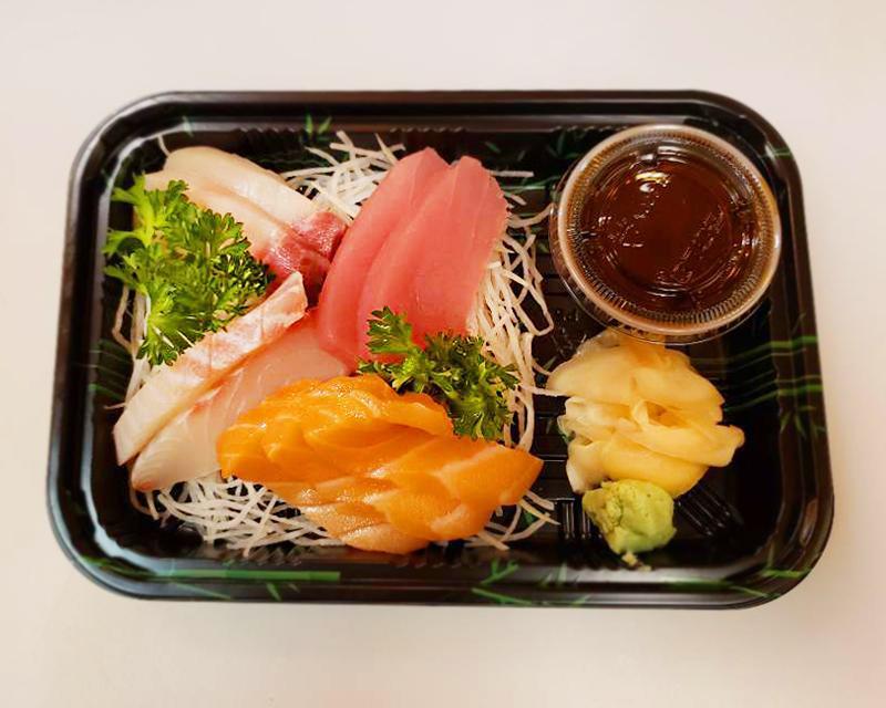 A28. Sashimi · 7 pieces assortment of slice raw fish.