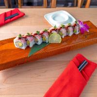 Yuzu Hamachi Roll · Raw. Hamachi, avocado and cucumber topped with hamachi, grilled green onion, Yuzu Kosho and ...