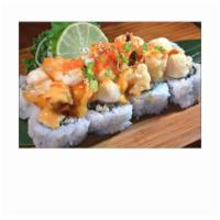 Volcano  · Tempura salmon & cucumber topped with baked tempura shrimp, scallops, masago, scallions, spi...