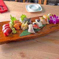 Sushi and Sashimi Combo · Raw. 6 pieces nigiri sushi and 10 pieces sashimi.