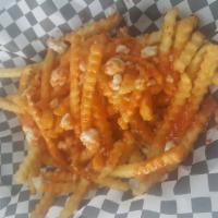 Buffalo Fries · Topped with bleu cheese crumbles and buffalo sauce.