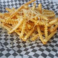 Truffle Fries · Tossed in truffle oil, Parmesan cheese and rosemary.