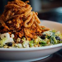 BBQ Chicken Chopped Salad · House-smoked pulled BBQ chicken, romaine, iceberg, red leaf, tomatoes, cucumbers, black bean...