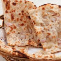 Onion Naan · Stuffed Indian bread with fine chopped onions and cilantro.