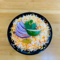 Hyderbadi Vegetable Dum Biryani · House special rice dish made with aromatic basmati rice and chef's secret ingredients, slow ...