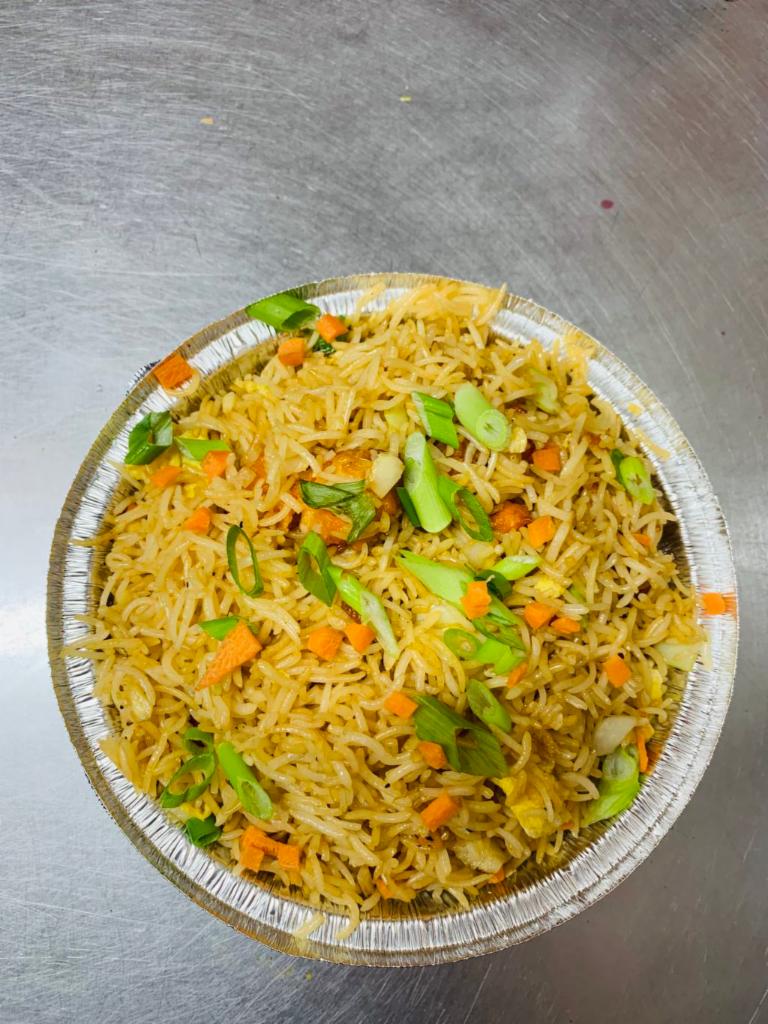 Fried Rice · stir fried rice tossed with soy sauce and mix vegetables