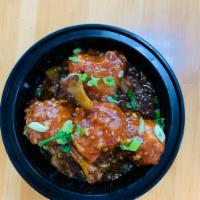 Drums Of Heaven · marinated chicken wings tossed with special house made sauce