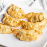 A8. Potstickers · Deep-fried potsticker.  Choice of pork or chicken with assorted veggies.