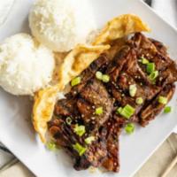 T4. BBQ Kalbi Plate (Short Rib) · The most famous dish in Korea.  BBQ beef short ribs, the ribs are marinated in a sweet sauce...
