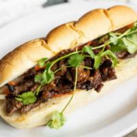 T7.  BBQ Beef Bulgogi Sandwich · Marinated with house special sauce & BBQ beef (ribeye) w/mozzarella cheese, grilled onion on...
