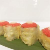 Volcano Roll · In: Deep Fried California Roll. Top: Masago, Mayo Mixed Toasted with Special Sauce.