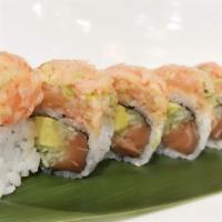 Alaskan Special Roll · In: Salmon, Avocado and Cucumber. Top: Salmo, Kani, Masago with Spicy Sauce Mixed.