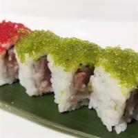 Christmas Roll · In: Tuna and Yellowtail. Top: Red and Wasabi Tobiko.