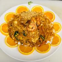 Pad Thai · Served w. Soup or Salad.
Thai Style Stir-Fried Noodle Sauteed w Egg, Bean Sprouts, Peanut & ...