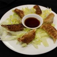 A3. Pan-Fried Chicken Potstickers · 6 pieces.