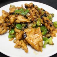 C10. Chicken with Black Bean Sauce · White onions, green bell peppers, black beans.